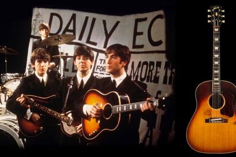 Les beatles jouant un morceau à la guitare